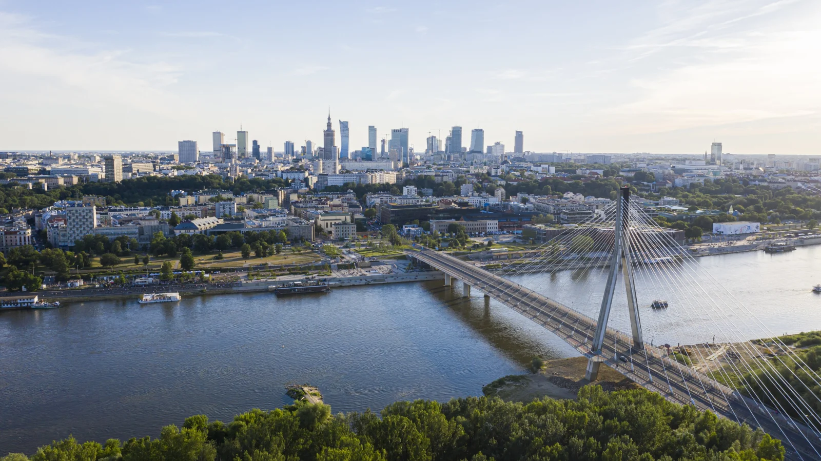 Warsaw skyline over the Vistula and Świętokrzyski Bridge in summer